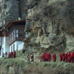 bhutanese monks walking in a file